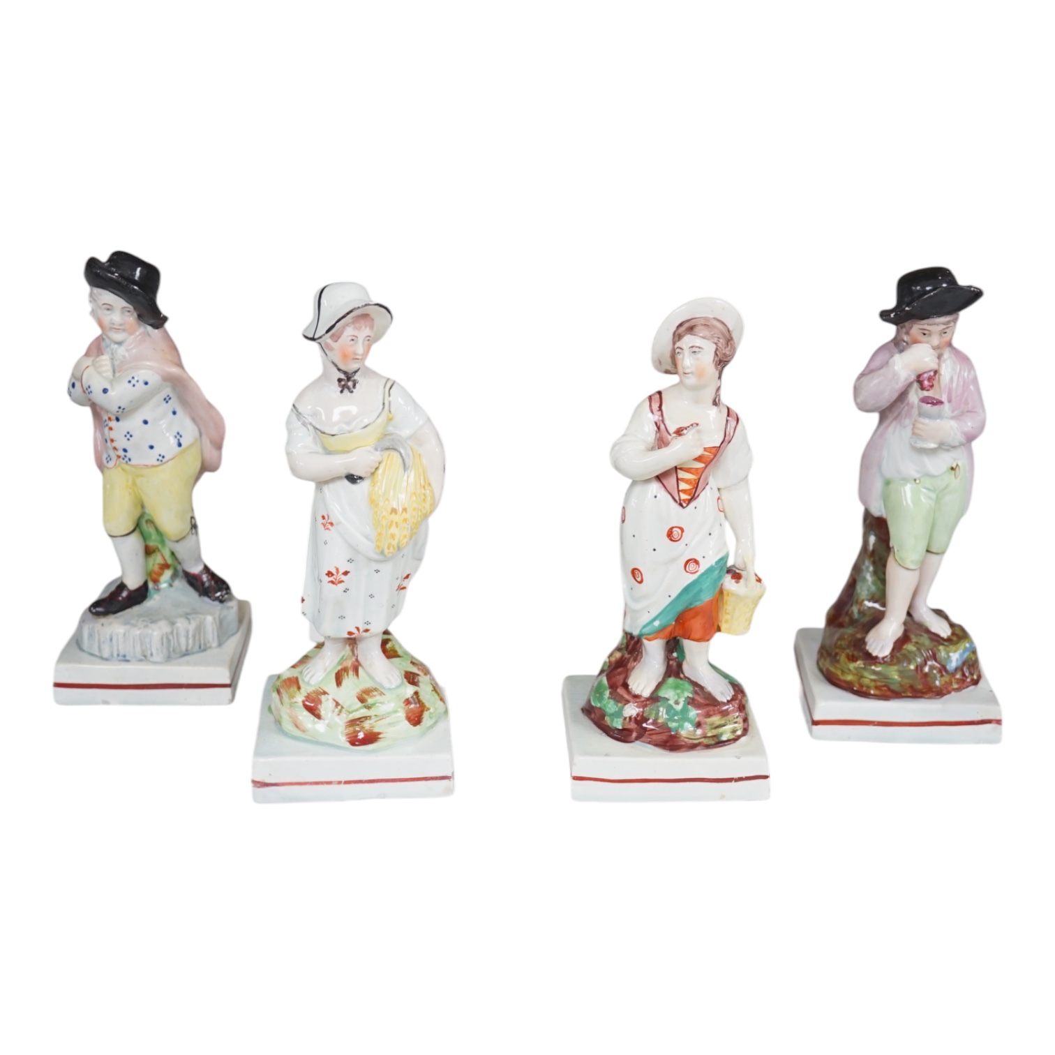 Four Enoch Wood pearlware models of the Seasons, c.1810, tallest 19.5cm. Condition - base of Autumn restored at the back otherwise fair to good